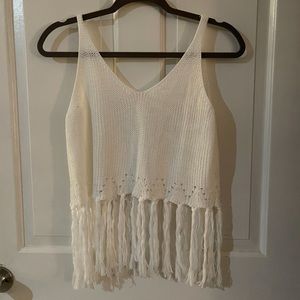White crochet crop top with tassels - it is see thru. Runs as a small.